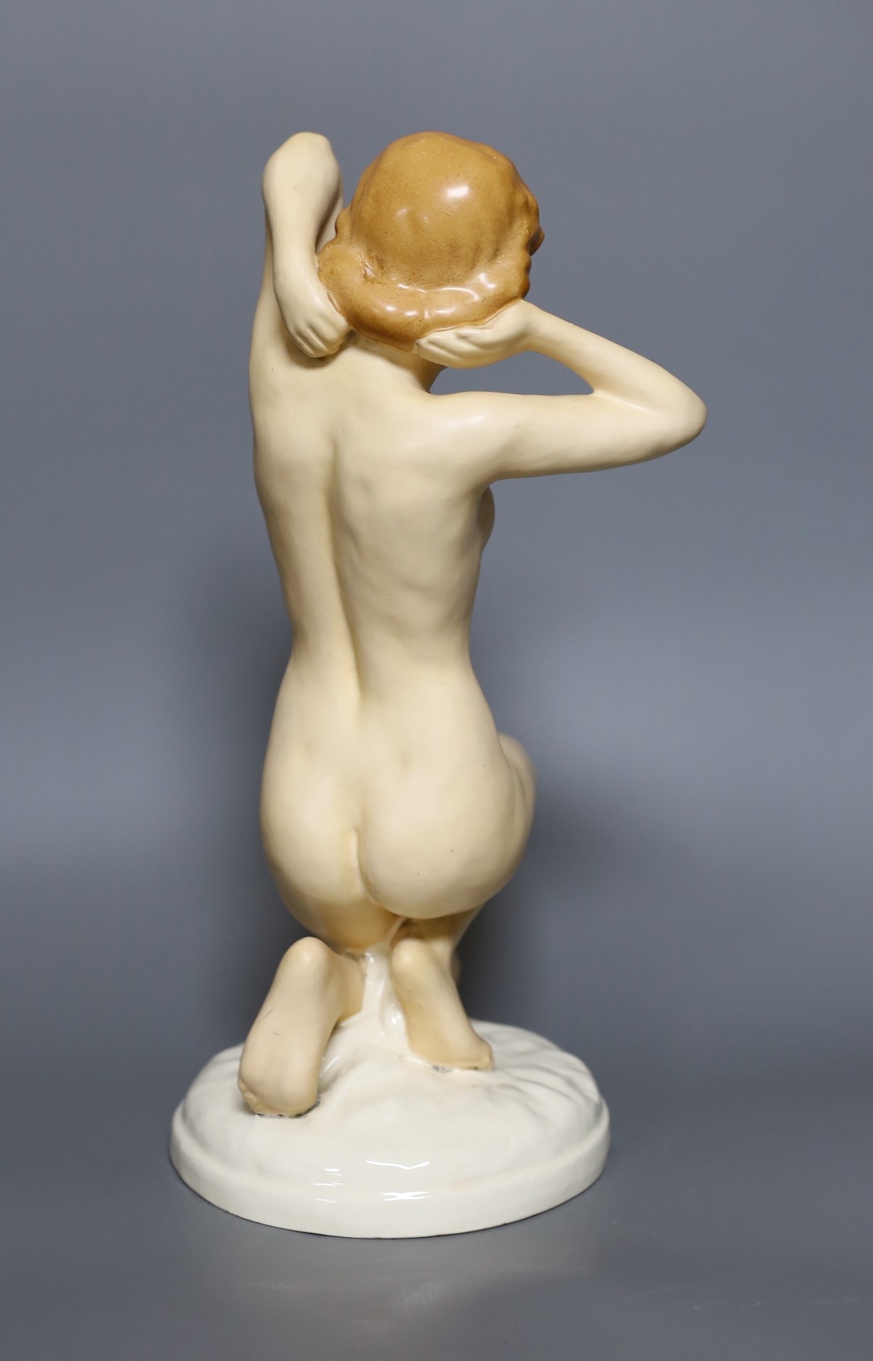 A Royal Dux porcelain figure of a nude lady, 35cm